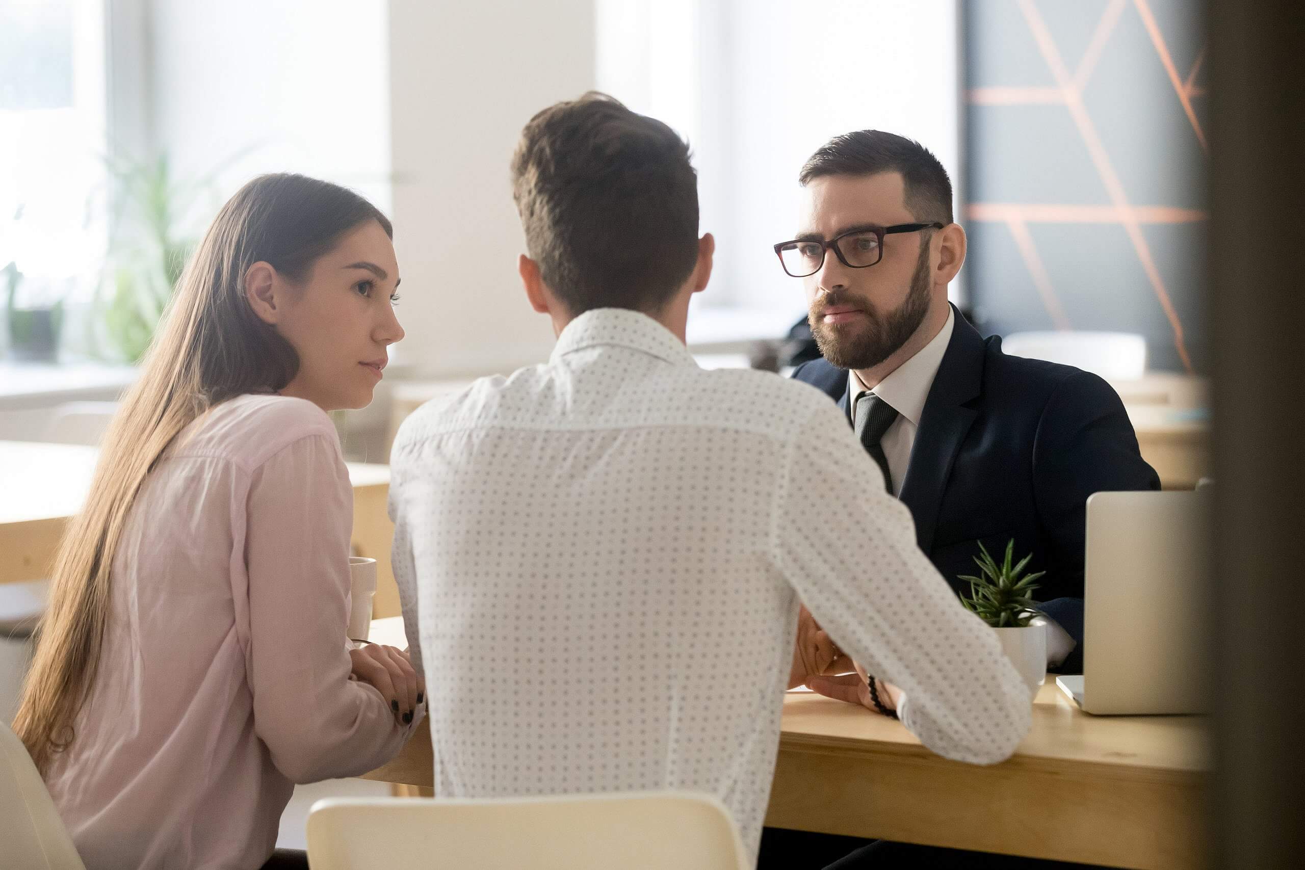 A couple meeting with attorney to discuss sexual assault allegation.