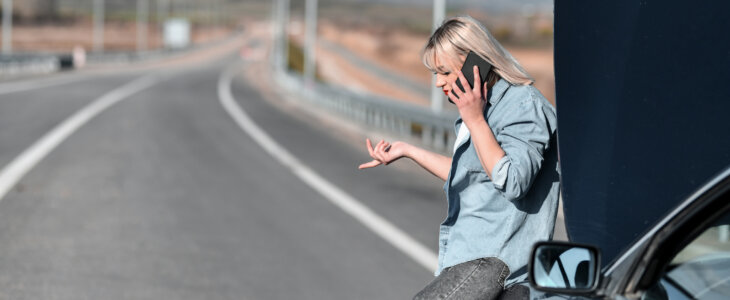 Road Assistance Needed For Blond Female While Car Breaks Down On Highway